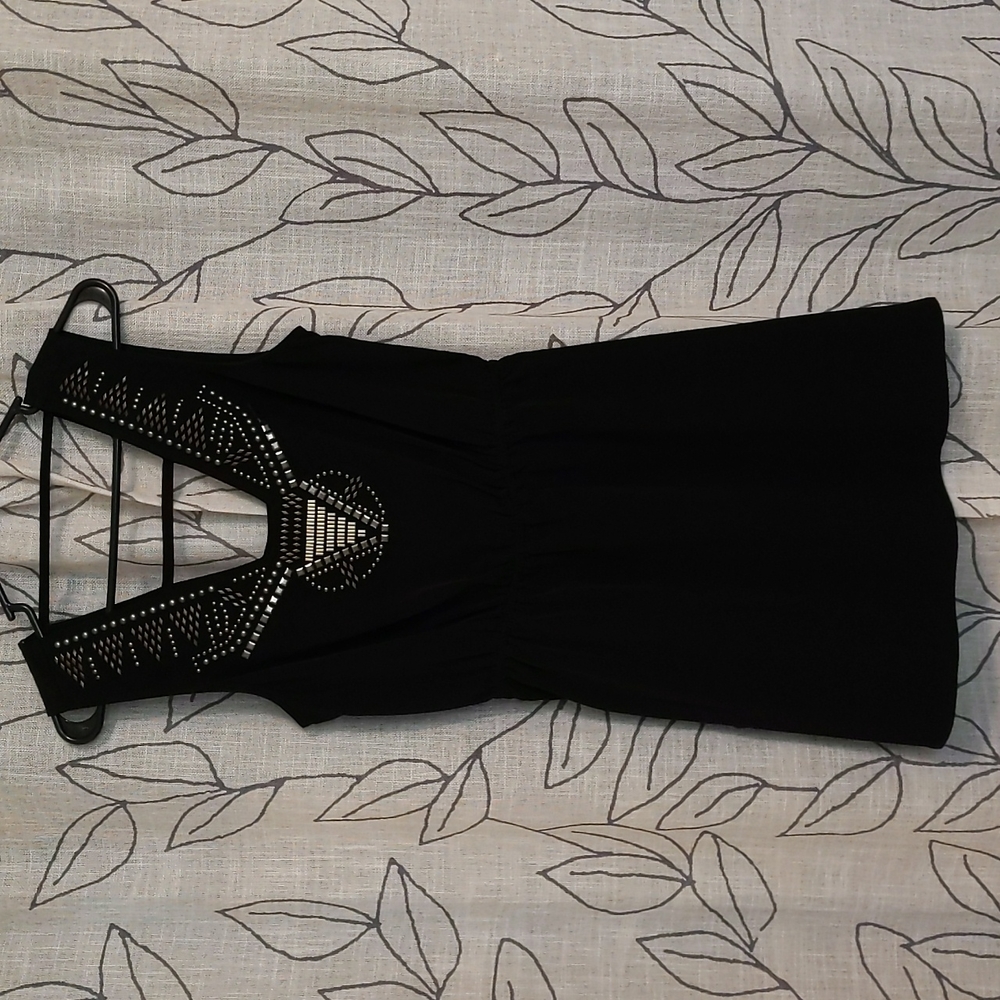 Black mini dress with gold embellishments